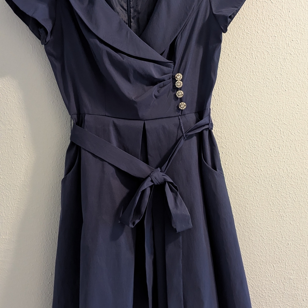 Blue Midi Fit and Flare Dress with Pleated Wrap Design and Flutter Sleeves
